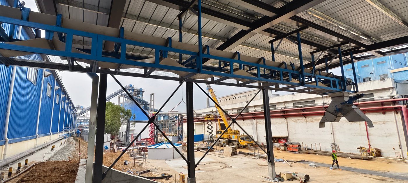 Steel-framed belt conveyor gallery and transfer structure at a pulp and paper mill upgrade project