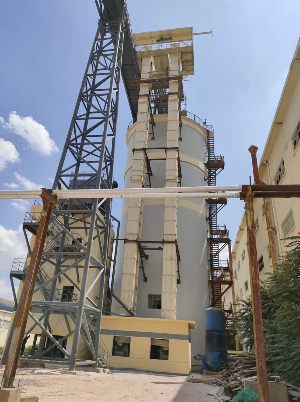 Bucket elevator and conveying tower at a zinc-indium smelter site in China